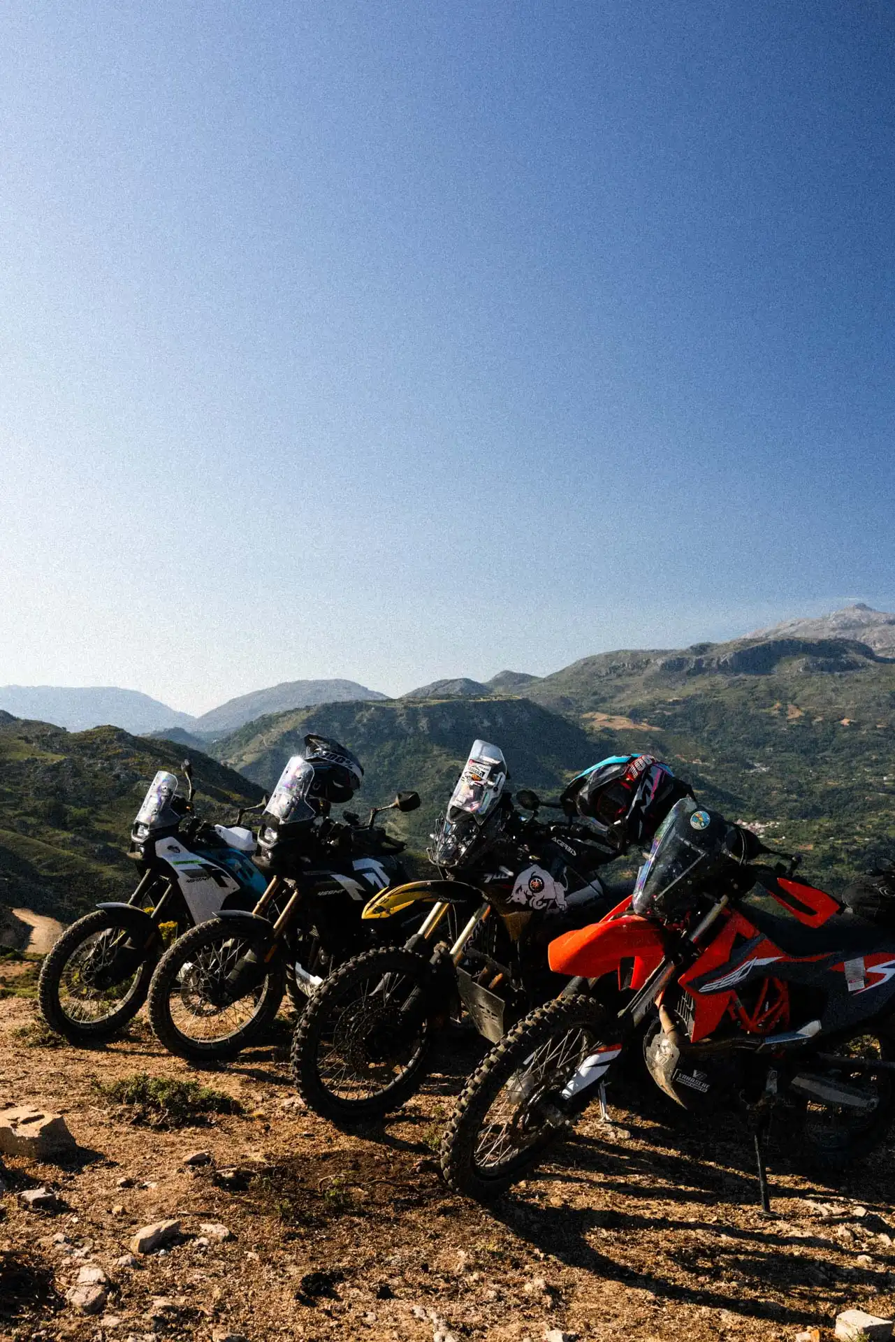 Motorcycle rider on a dramatic mountain road in Crete